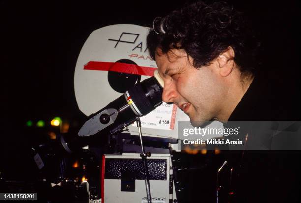 Profile of Australian film director George Miller as he looks through the lens of the motion picture camera on the set of his film 'Lorenzo's Oil',...