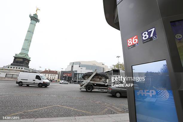 Picture taken on April 17, 2012 shows a screen of the "Concept Abribus" bus shelter on the Bastille Square on April 17, 2012 in Paris, by France's JC...