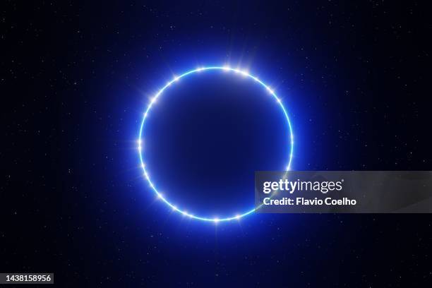 halo of light surrounding black hole - sky blue ball stock pictures, royalty-free photos & images