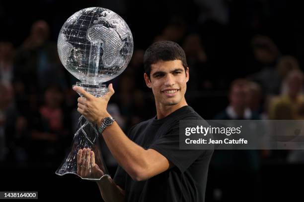 Carlos Alcaraz of Spain - wearing his Rolex watch - receives the ATP World Number 1 Trophy during day 1 of the Rolex Paris Masters 2022, an ATP 1000...