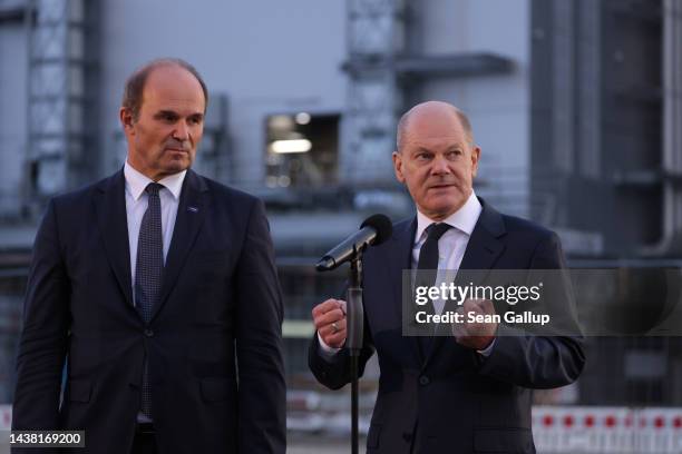 German Chancellor Olaf Scholz and BASF CEO Martin Brudermueller speak to the media after Scholz toured a new facility for manufacturing electric car...
