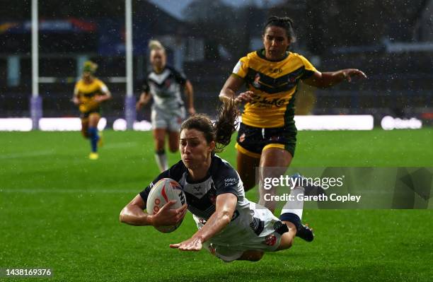 Courtney Winfield-Hill of England touches down for their team's thirteen try during the Women's Rugby League World Cup Group A match between England...