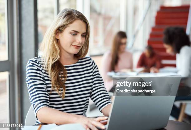 laptop, studying and student woman with project research, online course or website for university, scholarship or school information. college girl typing on her pc at the students workspace or campus - financial aid stock pictures, royalty-free photos & images
