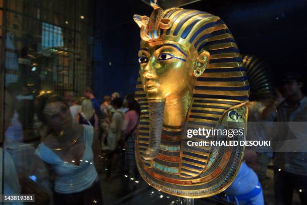 Picture taken on October 20, 2009 shows King Tutankhamun's golden mask displayed at the Egyptian museum in Cairo. DNA testing has unraveled some of...