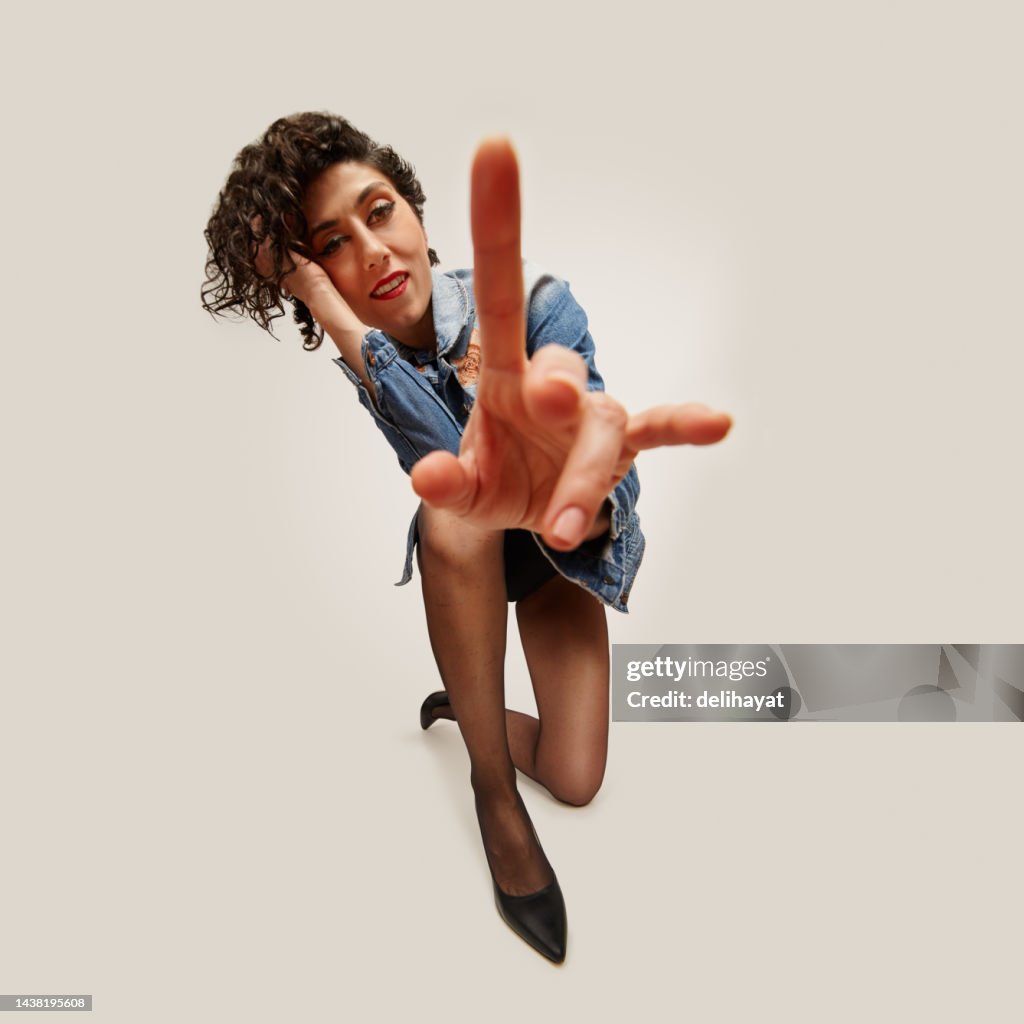 Fashion model posing in studio