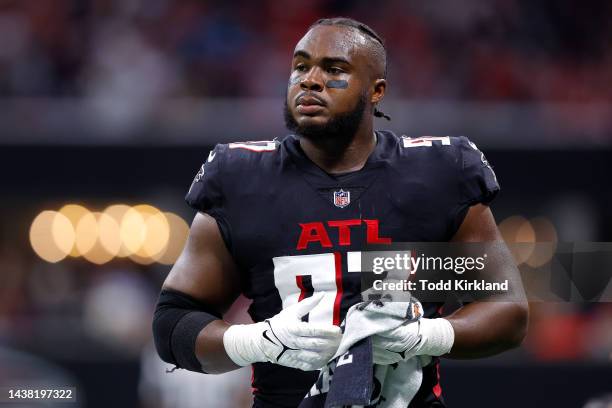Grady Jarrett of the Atlanta Falcons looks on during the first half against the Carolina Panthers at Mercedes-Benz Stadium on October 30, 2022 in...