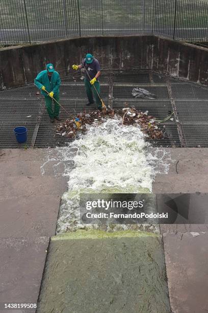 dam cleaning - storm drain stock pictures, royalty-free photos & images