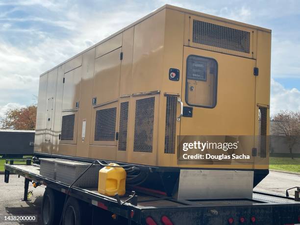 emergency backup electric generator on a moveable trailer - generator repair stock pictures, royalty-free photos & images