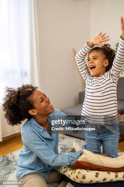 mother and daughter having fun - nosotros collection stock pictures, royalty-free photos & images