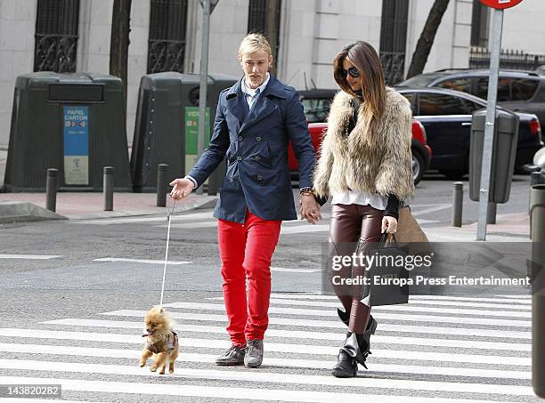 Spanish football player Jose Maria Gutierrez, Guti, and his girlfriend, Argentinian Tv presenter Romina Belluscio, are seen with their pet dog on...