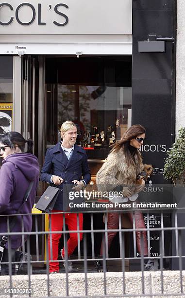 Spanish football player Jose Maria Gutierrez, Guti, and his girlfriend, Argentinian Tv presenter Romina Belluscio, are seen with their pet dog on...