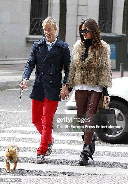 Spanish football player Jose Maria Gutierrez, Guti, and his girlfriend, Argentinian Tv presenter Romina Belluscio, are seen with their pet dog on...