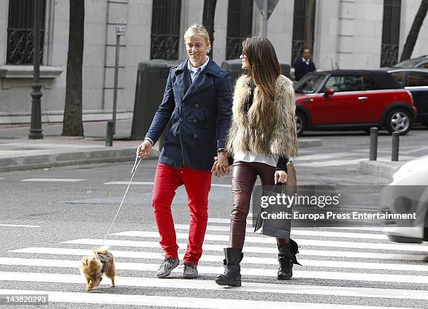 Spanish football player Jose Maria Gutierrez, Guti, and his girlfriend, Argentinian Tv presenter Romina Belluscio, are seen with their pet dog on...