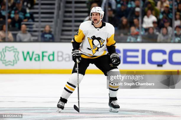 Brian Dumoulin of the Pittsburgh Penguins skates against the Seattle Kraken during the third period at Climate Pledge Arena on October 29, 2022 in...