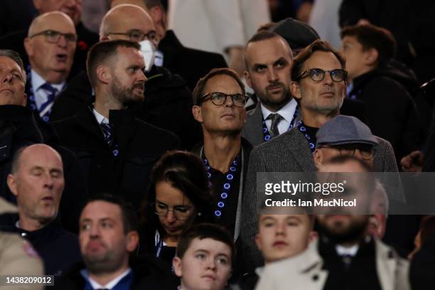Frank de Boer and Ronald de Boer, former footballers, look on prior to kick off of the UEFA Champions League group A match between Rangers FC and AFC...