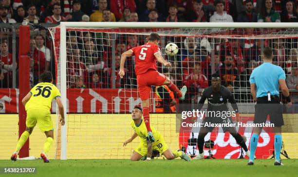 Benjamin Pavard of Bayern Munich scores their team's first goal during the UEFA Champions League group C match between FC Bayern München and FC...
