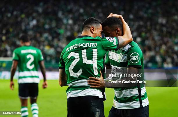 Arthur Gomes of Sporting CP celebrates scoring their side's first goal with teammate Pedro Porro during the UEFA Champions League group D match...