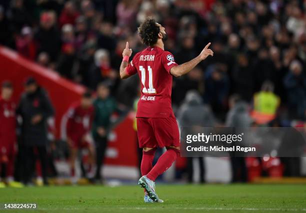 Mohamed Salah of Liverpool celebrates after scoring their team's first goal during the UEFA Champions League group A match between Liverpool FC and...