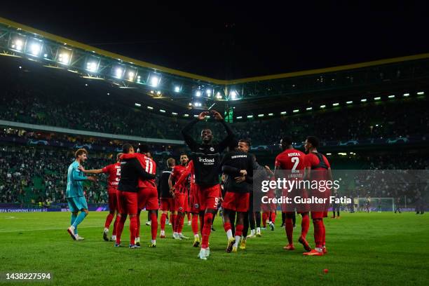 Players of Eintracht Frankfurt celebrates their side's win after the final whistle of the UEFA Champions League group D match between Sporting CP and...