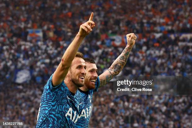 Pierre-Emile Hojbjerg celebrates with Harry Kane of Tottenham Hotspur after scoring their team's second goal during the UEFA Champions League group D...