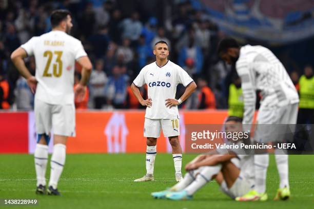 Alexis Sanchez of Marseille reacts after their sides defeat during the UEFA Champions League group D match between Olympique Marseille and Tottenham...
