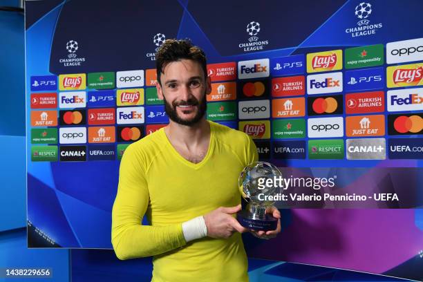 Hugo Lloris of Tottenham Hotspur is presented with the PlayStation Player of the Match after the final whistle of the UEFA Champions League group D...