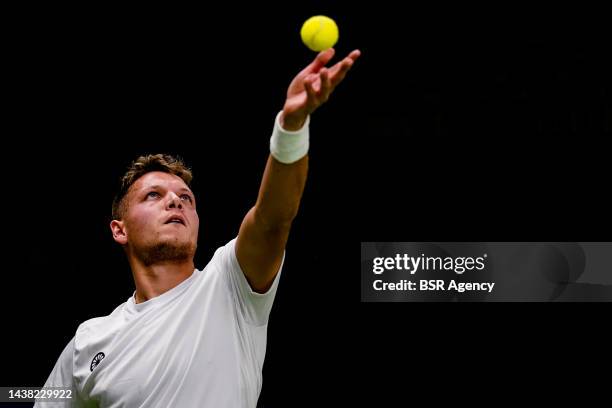Ruben Spaargaren of the Netherlands serves in his men's doubles match with Tom Egberink of the Netherlands against Martin de la Puente of Espania and...