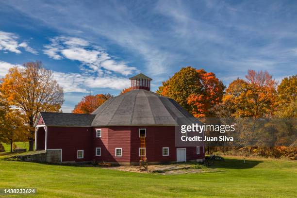 round barn, on a country road in autumn - morristown stock pictures, royalty-free photos & images