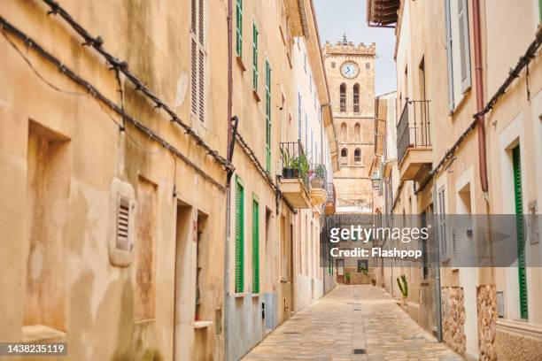 beautiful view of a picturesque street - pollensa stock pictures, royalty-free photos & images