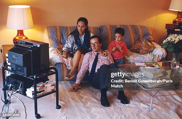 Archival photograph of French politician Francois Hollande at home with his wife Segolene Royal and one their three children photographed for Paris...