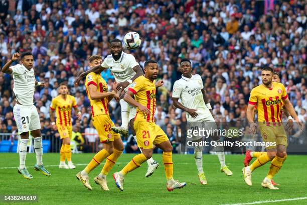Antonio Rudiger of Real Madrid CF battle for the ball with Yangel Herrera of Girona FC during the LaLiga Santander match between Real Madrid CF and...