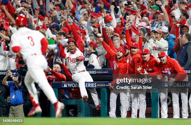 The Philadelphia Phillies dugout reacts after Bryce Harper of the Philadelphia Phillies hits a two-run home run against the Houston Astros during the...