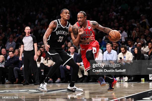 DeMar DeRozan of the Chicago Bulls is defended by Nicolas Claxton of the Brooklyn Nets during the second quarter of the game at Barclays Center on...