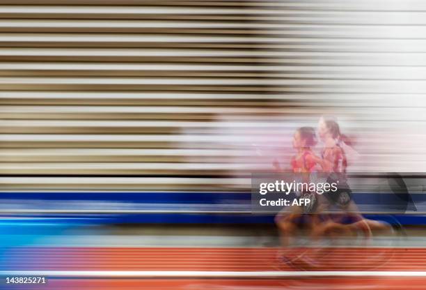 Competitors race in the Womens 5000 metres during the BUCS Outdoor Athletics Championships, a part of the London Prepares series of test events, at...