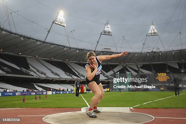 Serita Shone of LMC University who broke her back six months ago in a bobsleigh accident competes in the women's shot put qualification during day...