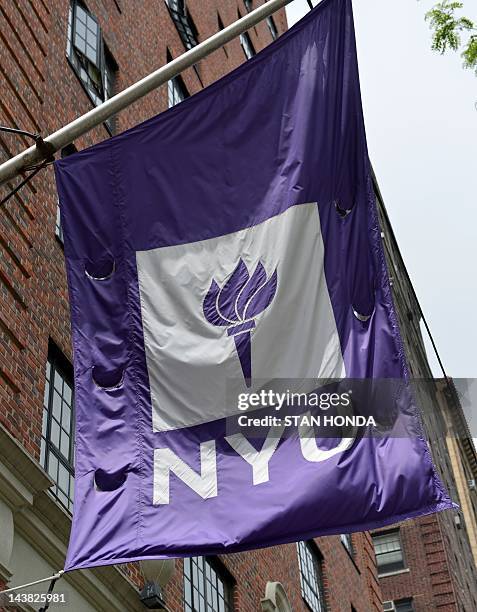 Flag flies from a building at New York University May 4, 2012 in New York. Chinese activist Chen Guangcheng has been invited to study at New York...