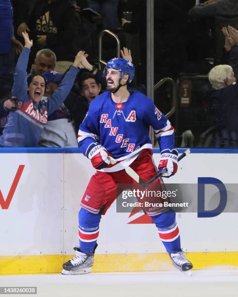 Chris Kreider of the New York Rangers scores the overtime winning goal against Carter Hart of the Philadelphia Flyers at Madison Square Garden on...