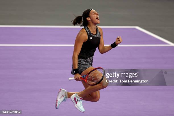 Caroline Garcia of France celebrates after defeating Coco Gauff of the United States in their Women's Singles Group Stage match during the 2022 WTA...