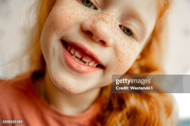 cute smiling girl with redhead and freckles - freckle stock pictures, royalty-free photos & images