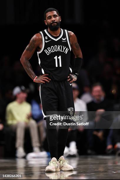 Kyrie Irving of the Brooklyn Nets looks on during a break in the action during the fourth quarter of the game against the Chicago Bulls at Barclays...