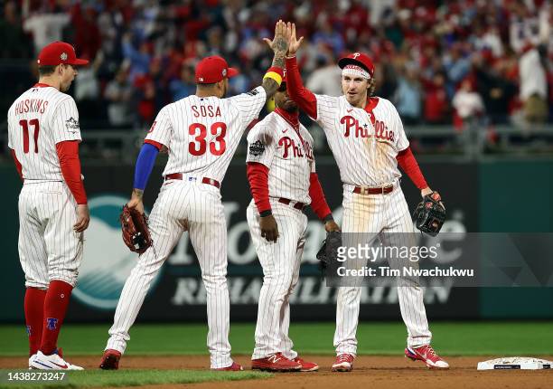 Edmundo Sosa and Bryson Stott of the Philadelphia Phillies celebrate after defeating the Houston Astros 7-0 in Game Three of the 2022 World Series at...