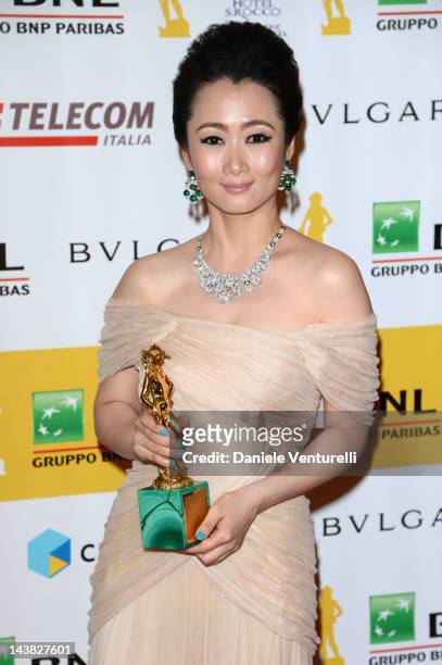 Actress Zhao Tao poses with the David di Donatello prize for Best Actress during the 'Premi David di Donatello' awards ceremony at the Auditorium...