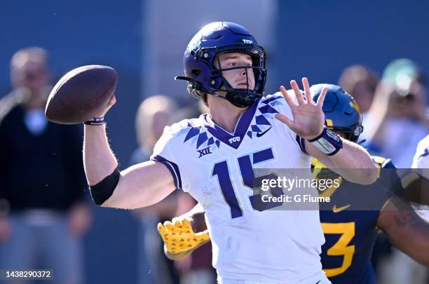 Max Duggan of the TCU Horned Frogs throws a pass against the West Virginia Mountaineers at Mountaineer Field on October 29, 2022 in Morgantown, West...