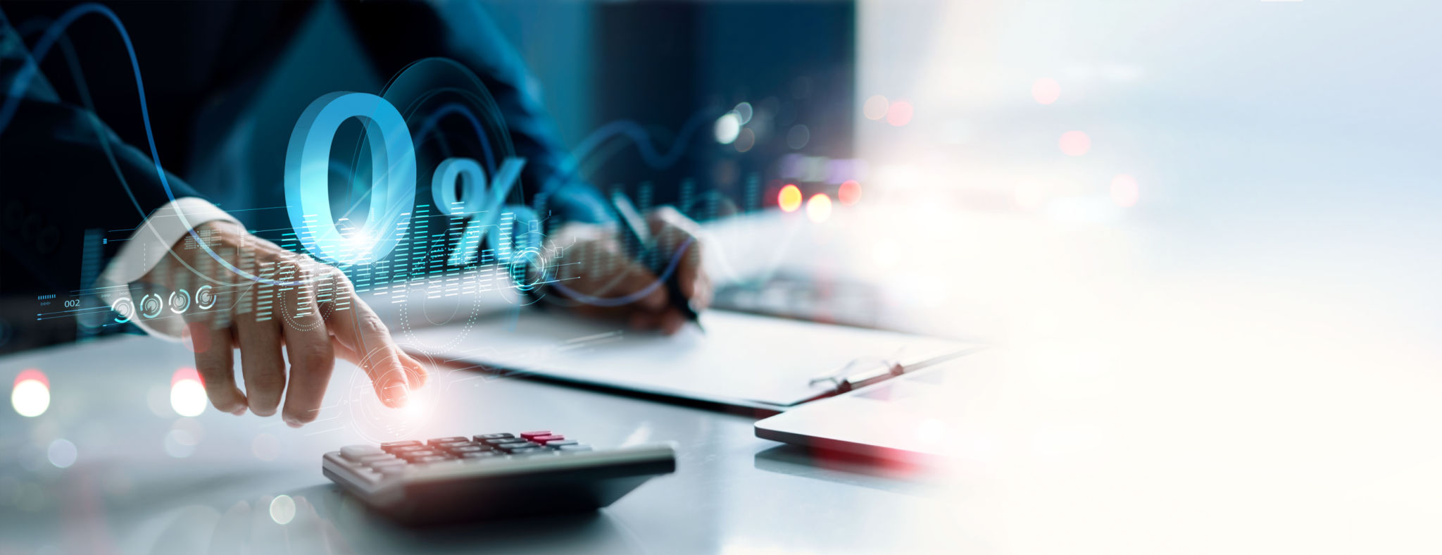 Businessman using a calculator to calculate the numbers with Zero percent sign. Zero percent commission. Economic recession. Interest rate burden. Payment. Discount and no commission. Businessman using a calculator to calculate the numbers with Zero percent sign. Zero percent commission. Economic recession. Interest rate burden. Payment. Discount and no commission.