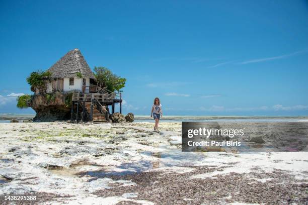 the rock restaurant zanzibar , over water house build in a coral rock in zanzibar tropical island - the rock restaurant stock pictures, royalty-free photos & images