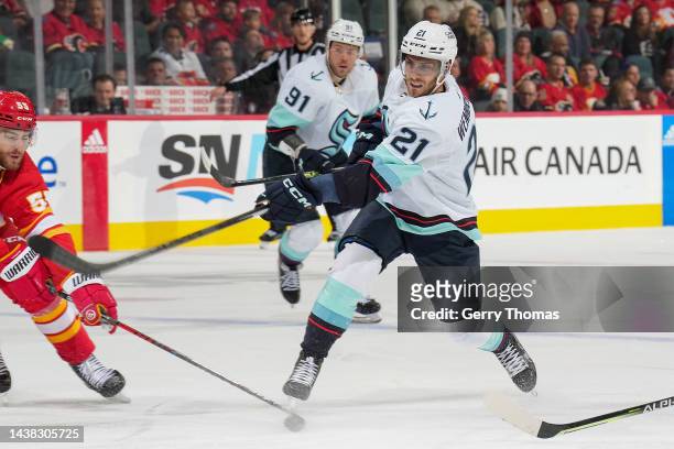 Alexander Wennberg of the Seattle Kraken takes a shot against the Calgary Flames at Scotiabank Saddledome on November 1, 2022 in Calgary, Alberta,...