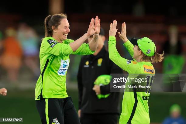 Sam Bates of Thunder celebrates the wicket of Suzie Bates of the Sixers during the Women's Big Bash League match between the Sydney Thunder and the...