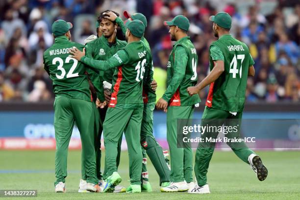 Hasan Mahmud of Bangladesh celebrates the wicket of KL Rahul of India during the ICC Men's T20 World Cup match between India and Bangladesh at...