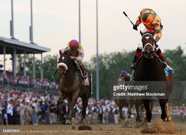 Rosie Napravnik celebrates atop Believe You Can after winning the 138th running of the Kentucky Oaks in front of Grace Hall ridden by Javier...