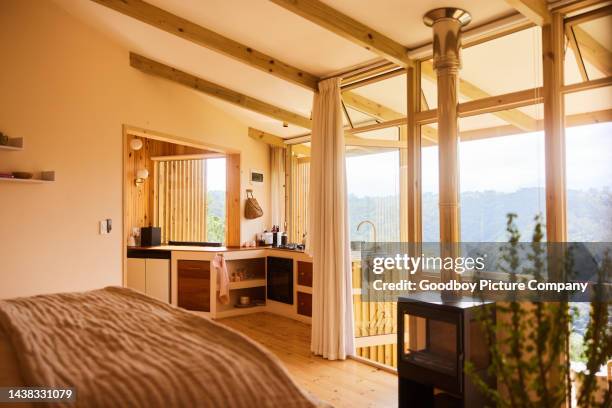 bedroom in a holiday home with a scenic view - duvet inners stock pictures, royalty-free photos & images